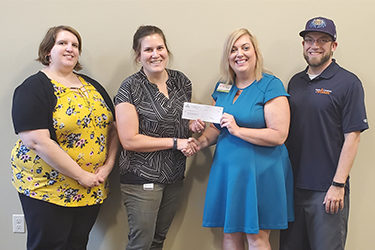 Young Professionals Give Back to Women’s Fund