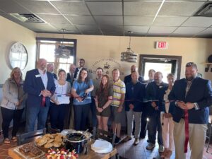 Large group at ribbon cutting