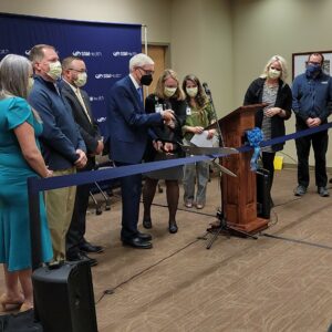 Large group at a ribbon cutting