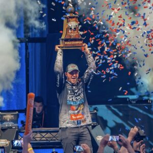 Man holding a trophy