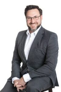Man in suit sitting