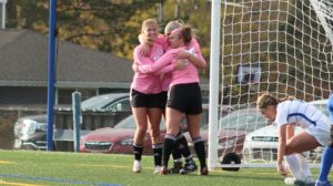 Three soccer players