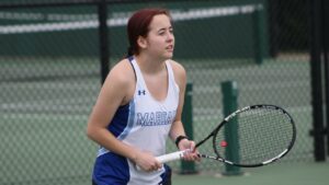 Young woman playing tennis