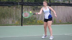 A woman playing tennis