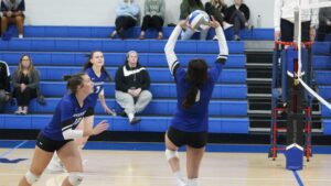 Women playing volleyball