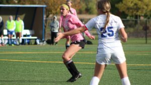 Women playing soccer