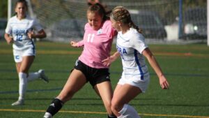 Women playing soccer