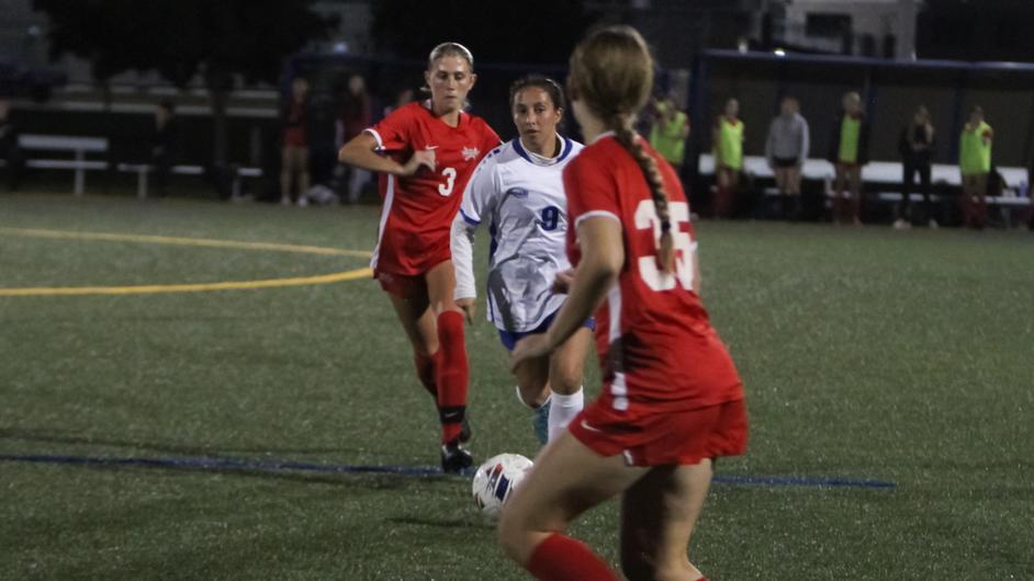 women playing soccer