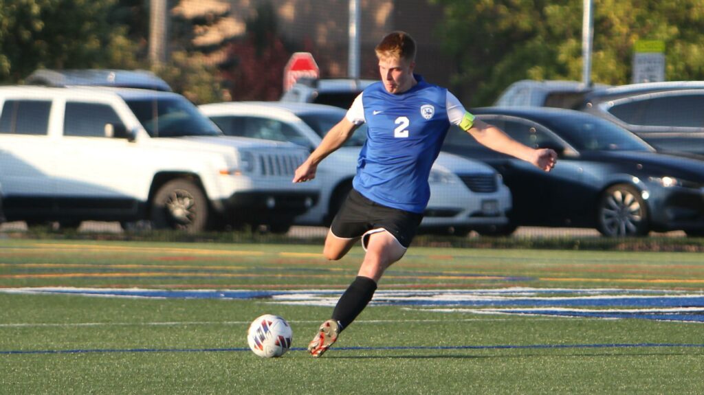 A man playing soccer