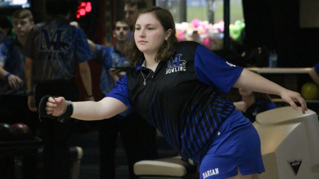 A woman bowling