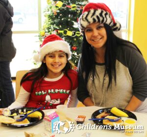 A woman and child dressed for Christmas