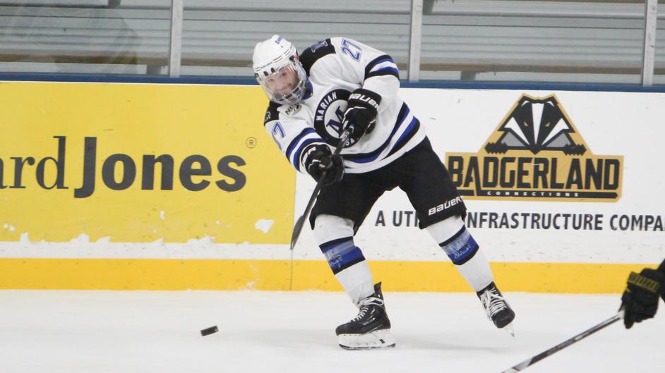 A man playing hockey