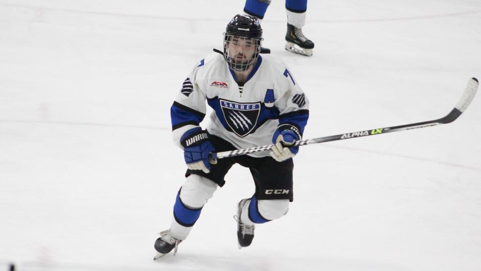 A man playing hockey