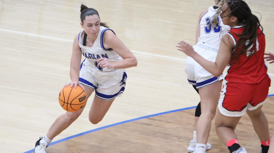 Women playing basketball
