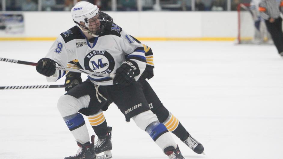Two men playing college hockey