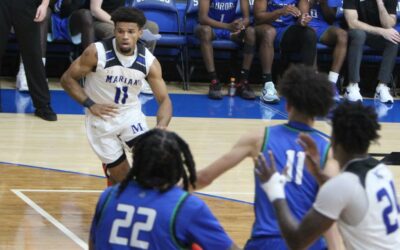 Marian men’s basketball holds off Aurora for overtime victory