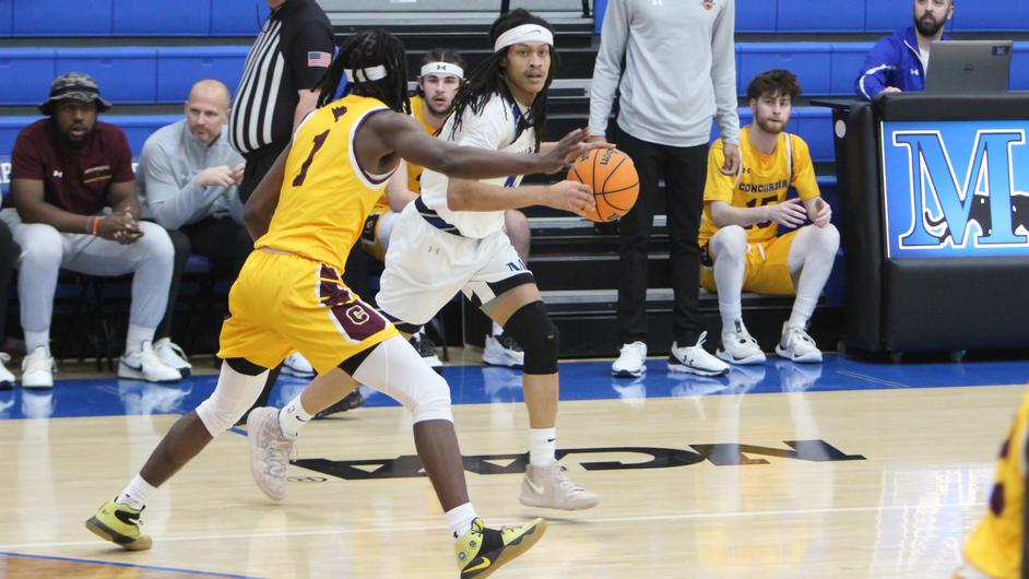 Men playing college basketball