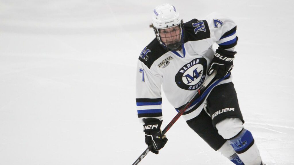 Male playing college hockey