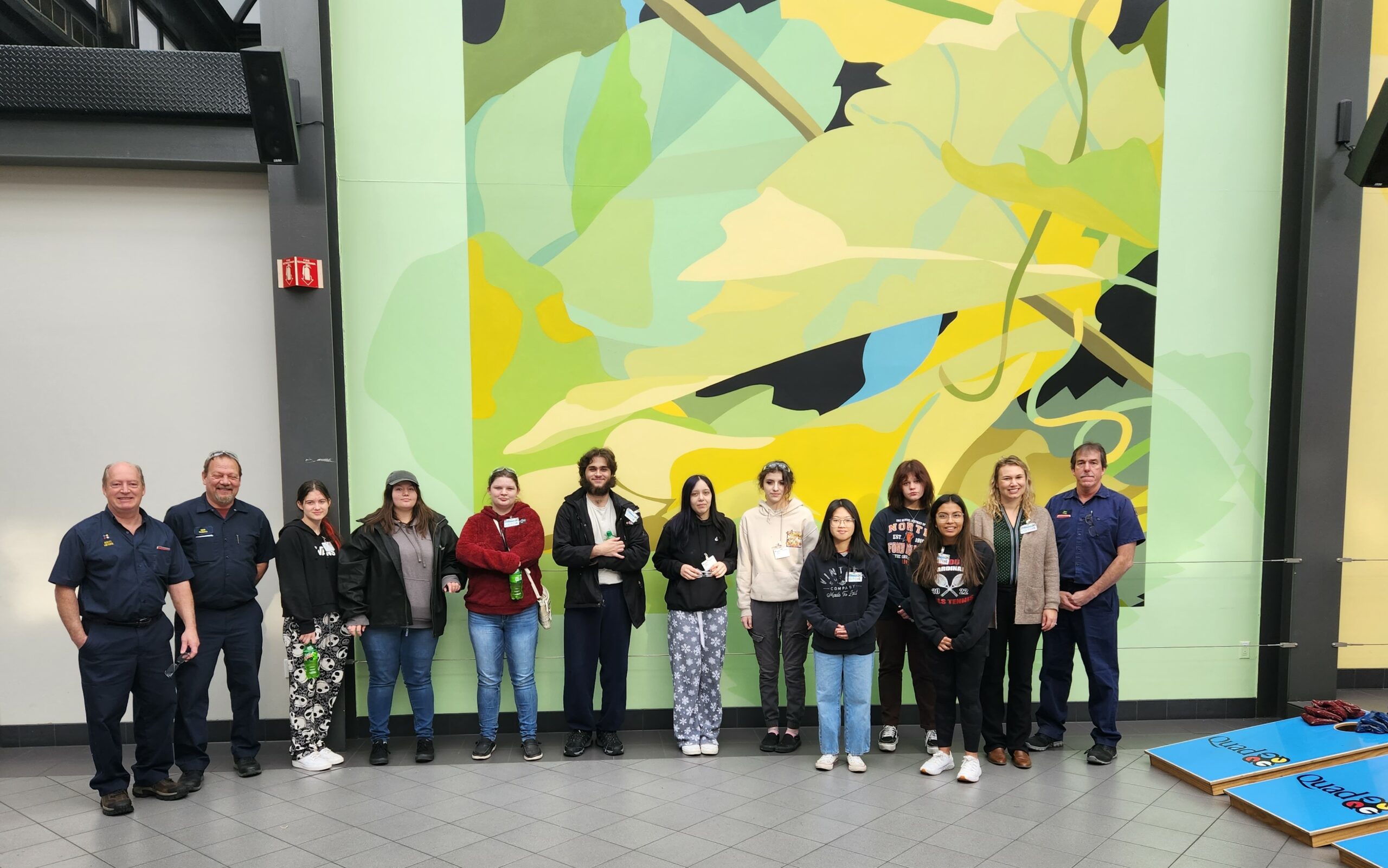 A group of students in a lobby