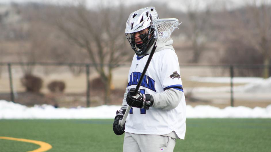 A man playing college lacrosse