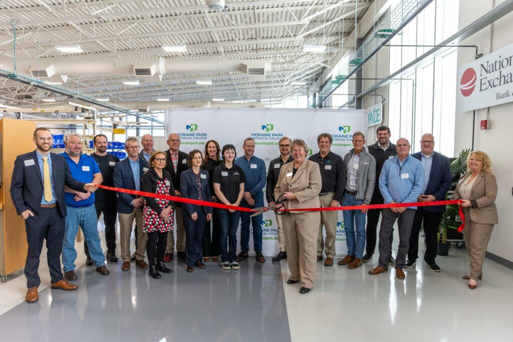 Large group at a ribbon cutting