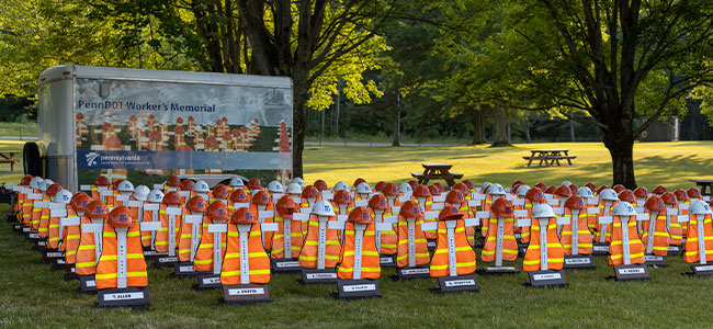 A large display of safety vest cutouts