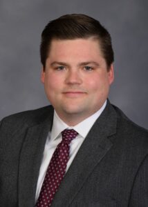 A business man in a suit and tie