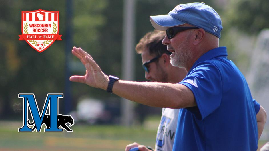 Two male soccer coaches