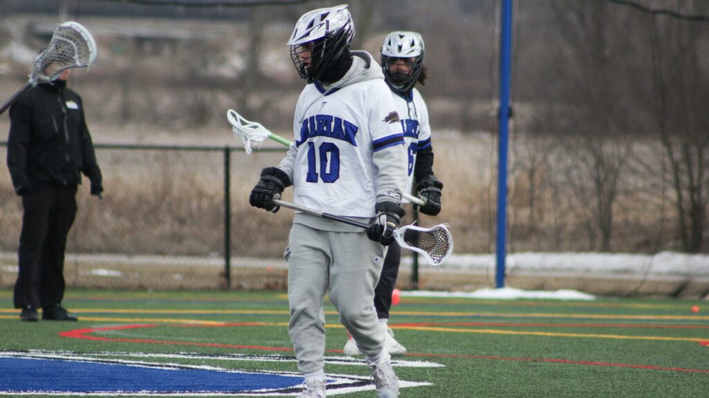 Men playing college lacrosse