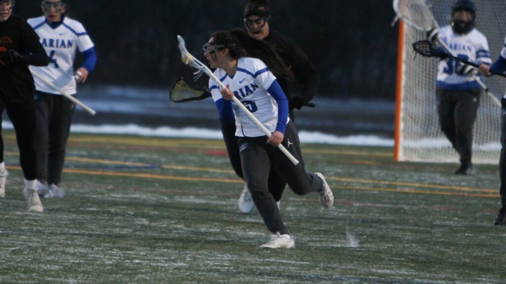 Women playing college lacrosse