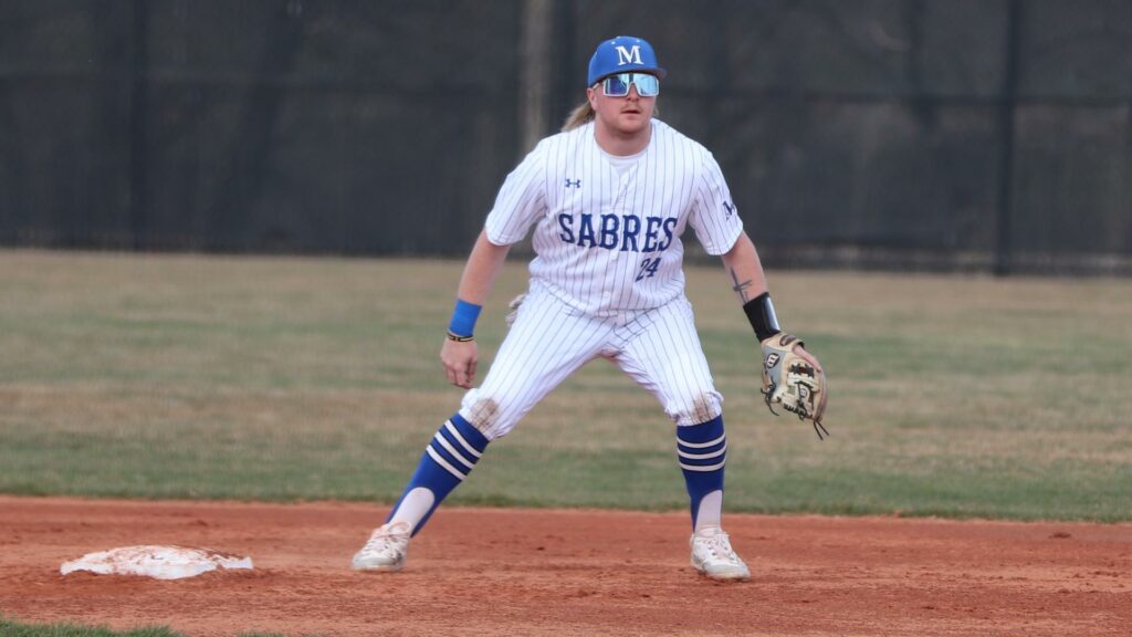 A man playing college baseball