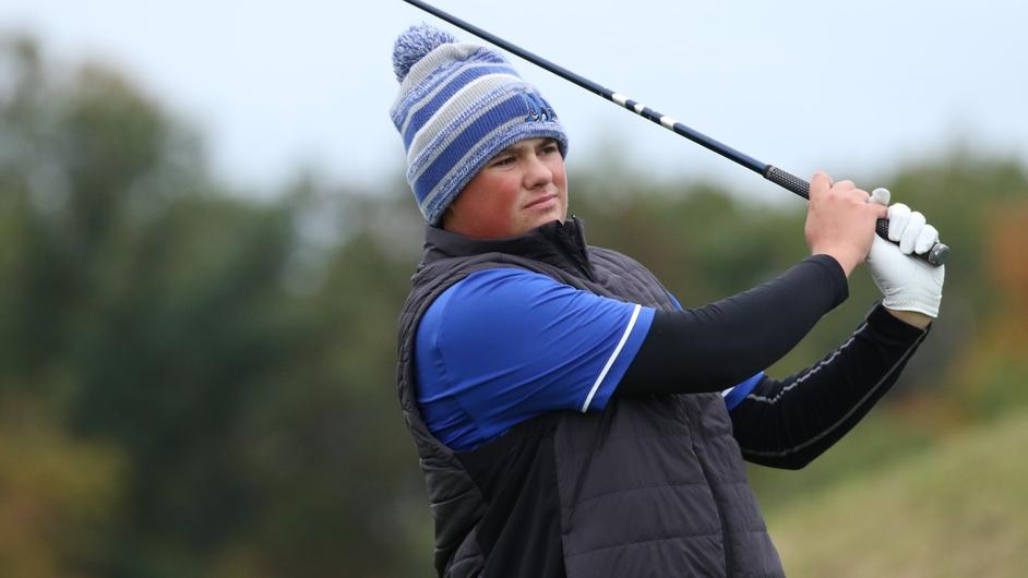 A man golfing