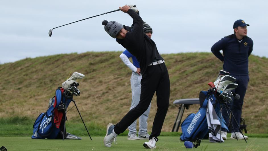 Men playing golf