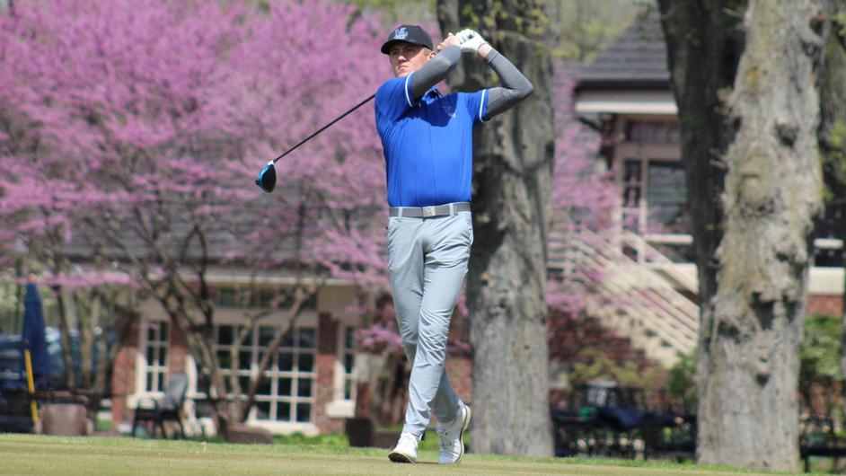 A man playing golf