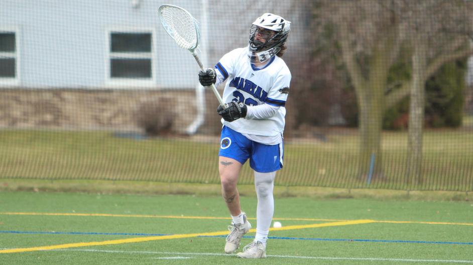 A man playing college lacrosse