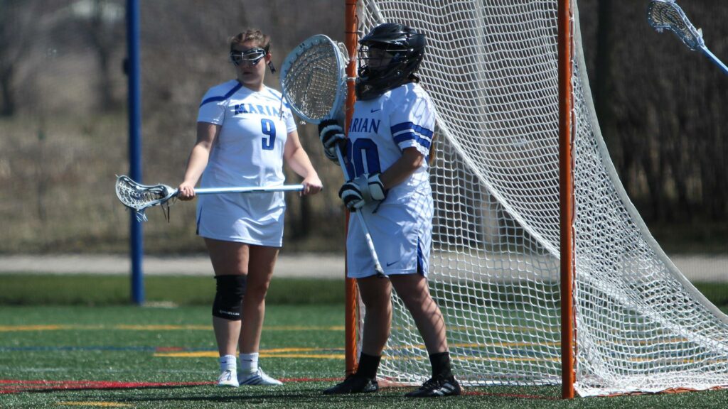 Women playing college lacrosse