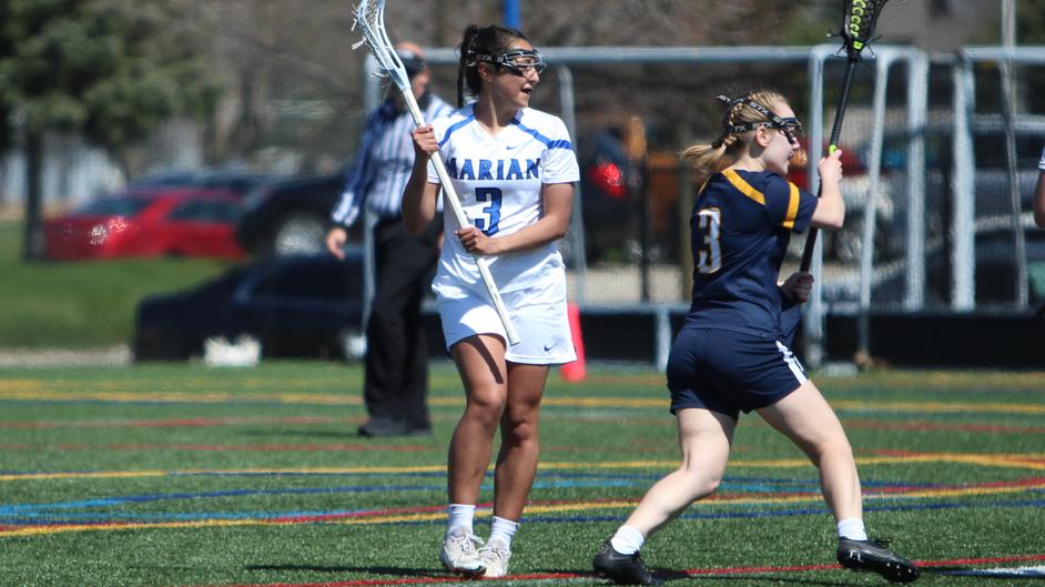 Women playing college lacrosse