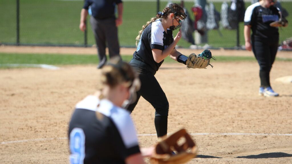 women playing softball