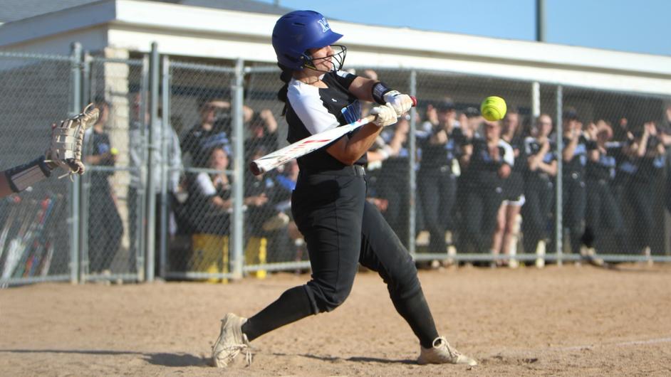 A female softball batter