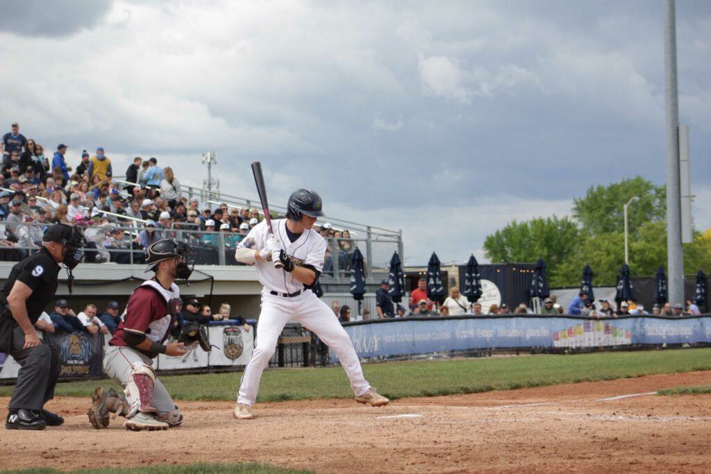 A man batting in a game