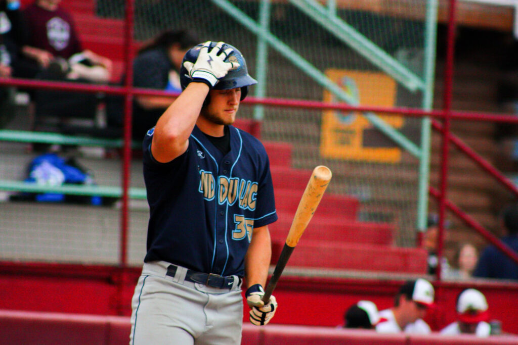 Baseball player getting ready to bat