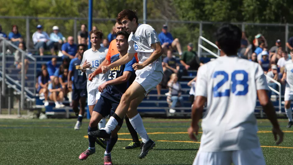 Men playing soccer