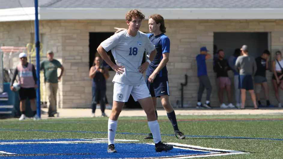 Men playing college soccer