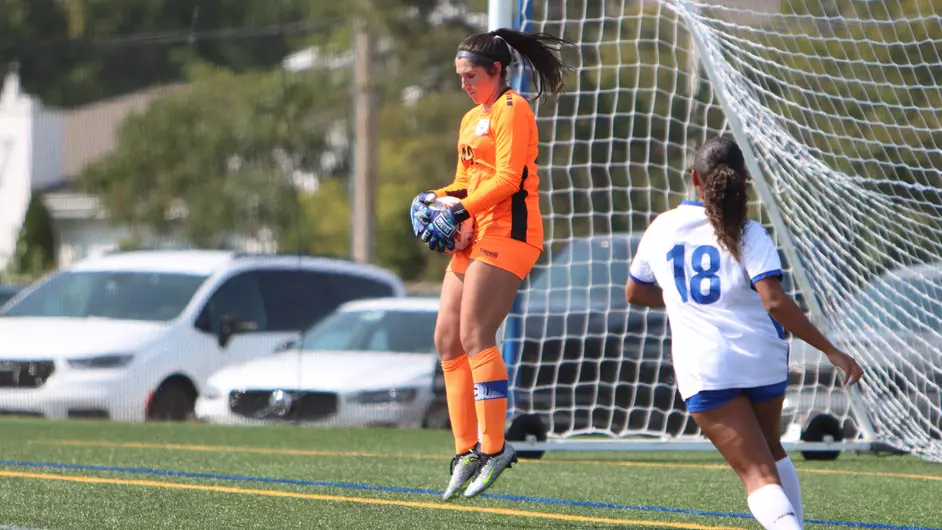 Women playing soccer