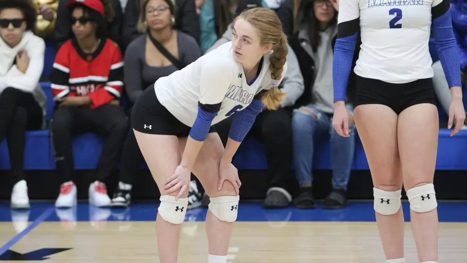 Women playing volleyball