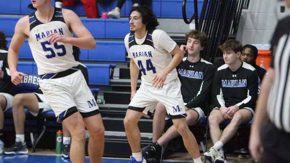 Men playing college basketball