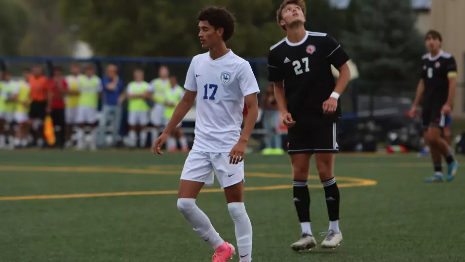 Men playing college soccer