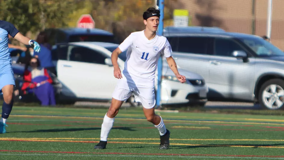 A man playing college soccer