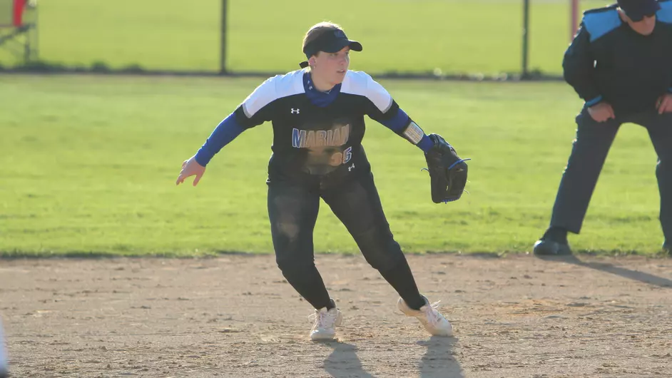 Women playing college softball