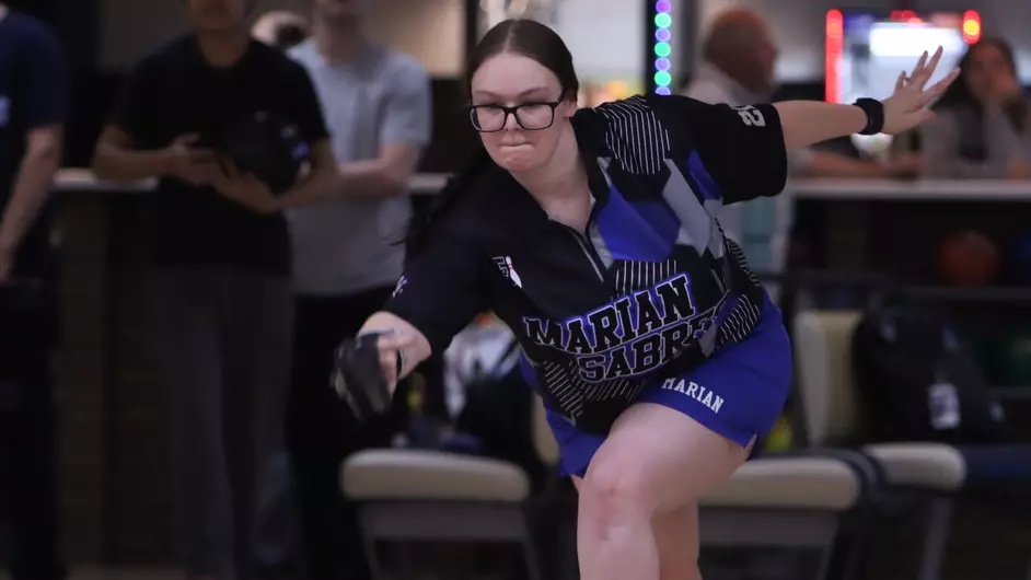 A woman bowling